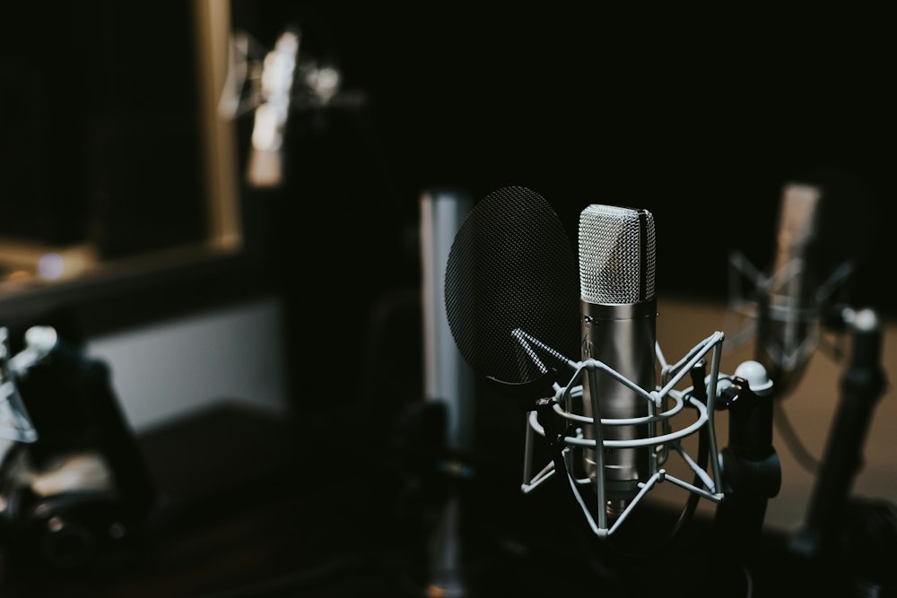 A microphone and headphones in a recording space